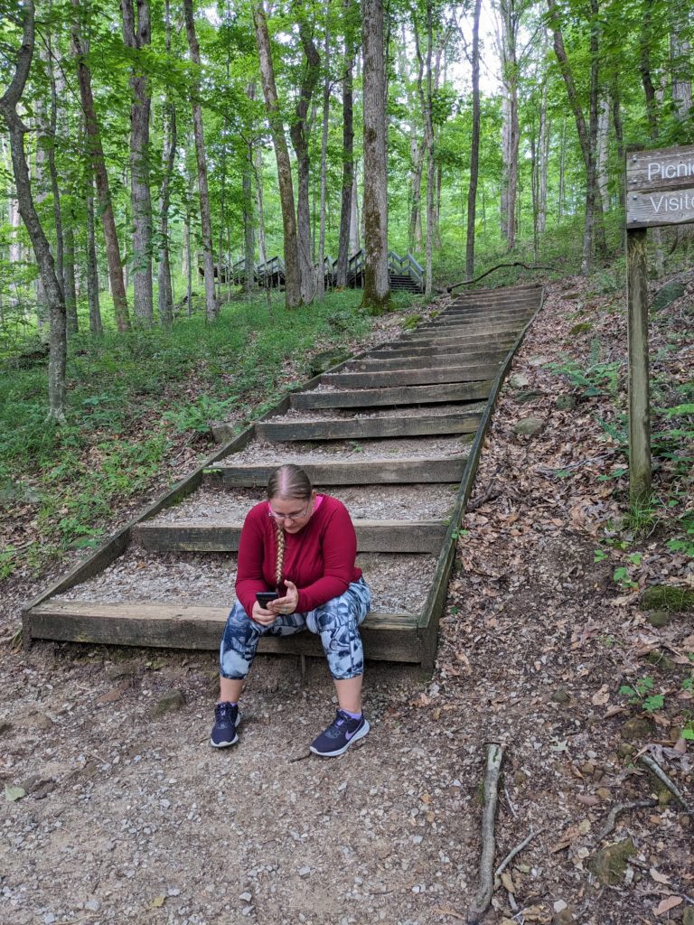 Taking a rest after a long stair climb is wise.