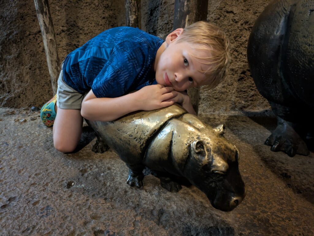 Riding the baby hippo