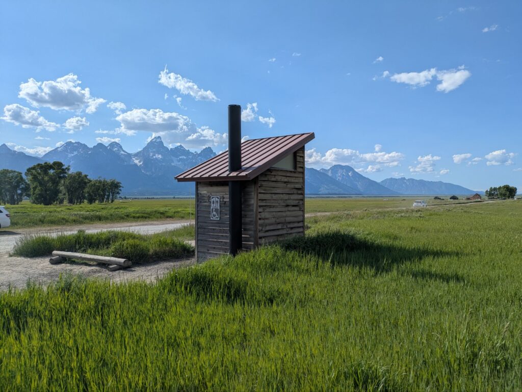 Mormon Row Pit Toilet—“If it drops in… say your goodbyes.”