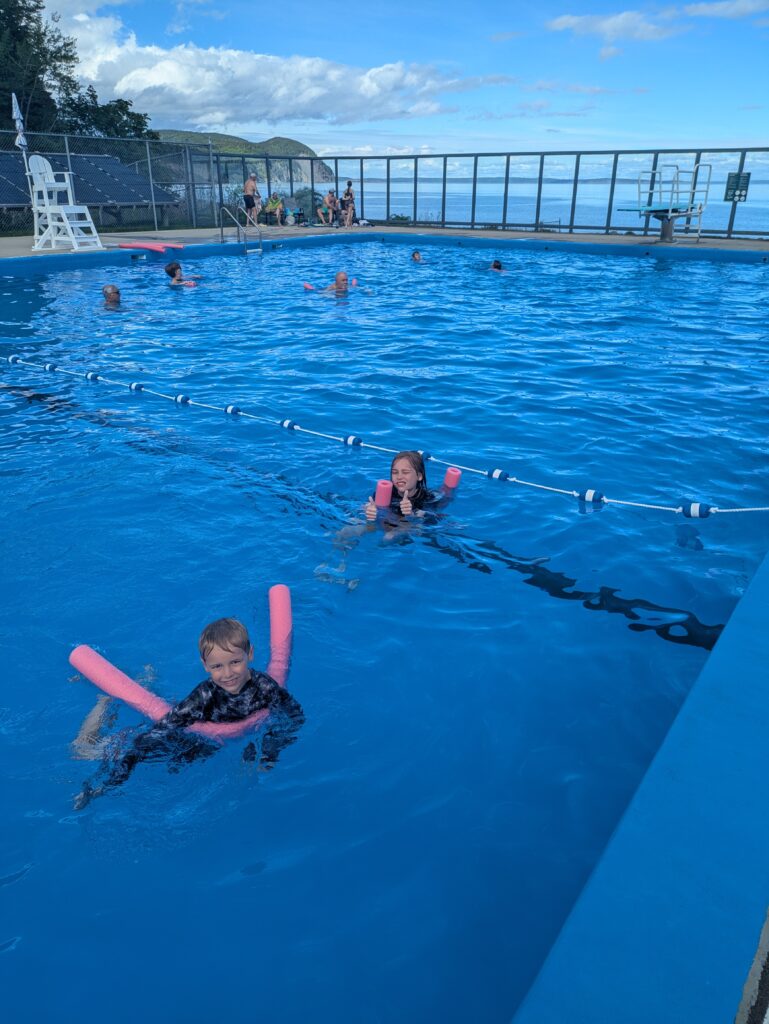 Lincoln and Madison Swimming in the Pool with the Best View (in the world)