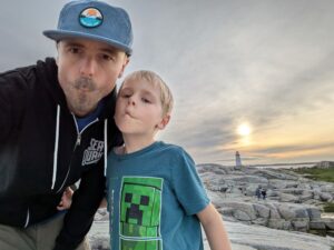 Dad and Madison putting our best Fish Faces at Peggy's Cove