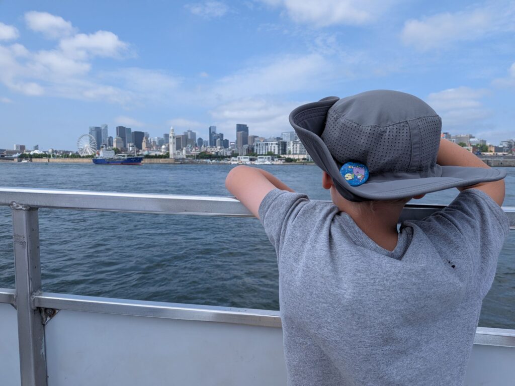 Madison Spotting Montreal from the Ferry