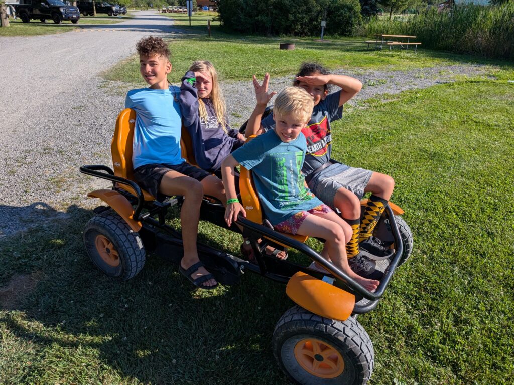 Cousins on a pedal car adventure